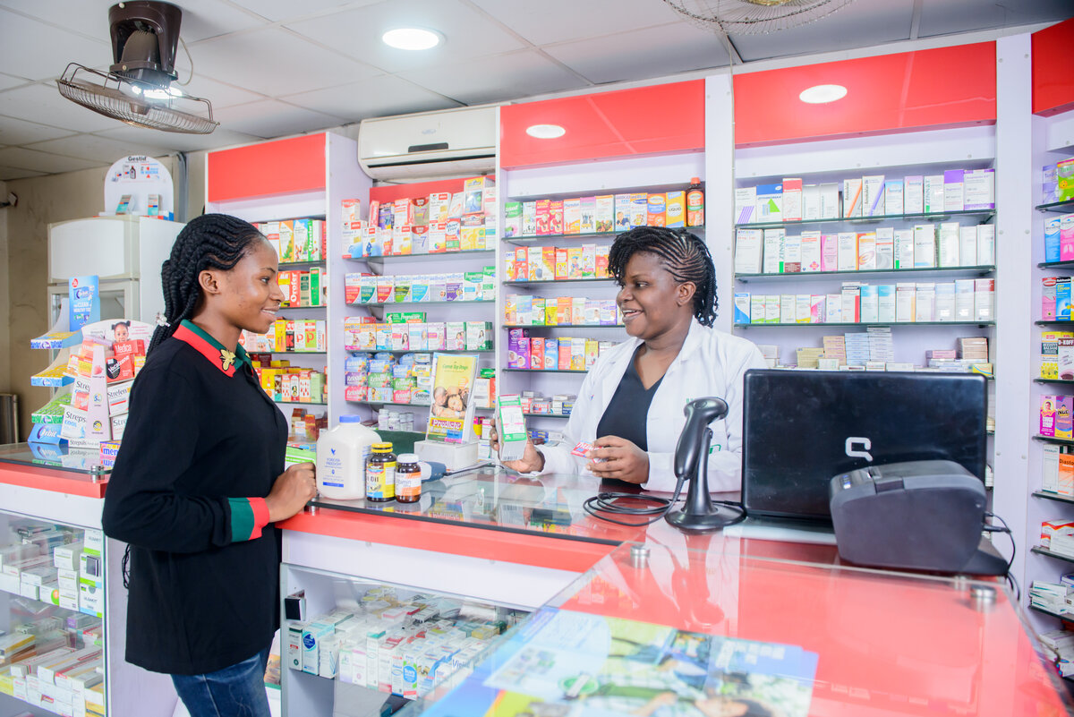JENJIL Pharmacy pharmacist serving a customer